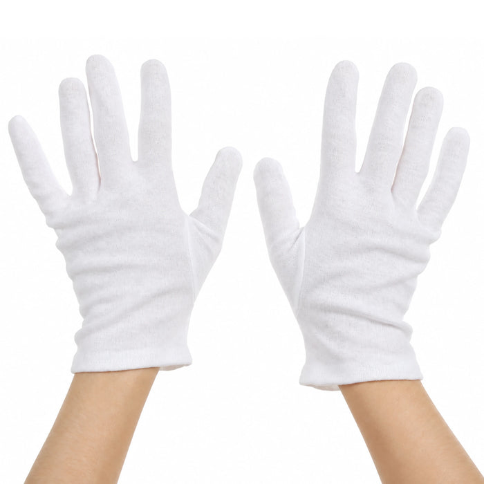 A pair of White cotton moisturizing gloves in use on hands
