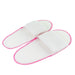 Non Woven Disposable Slippers side by side white with pink trim