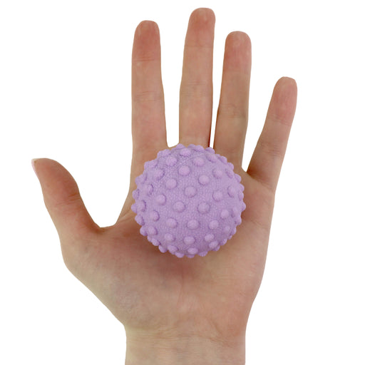 Yoga Body Massager Ball in palm of hand