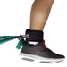 Thera-Band Extremity Straps around ankle pulling theraband
