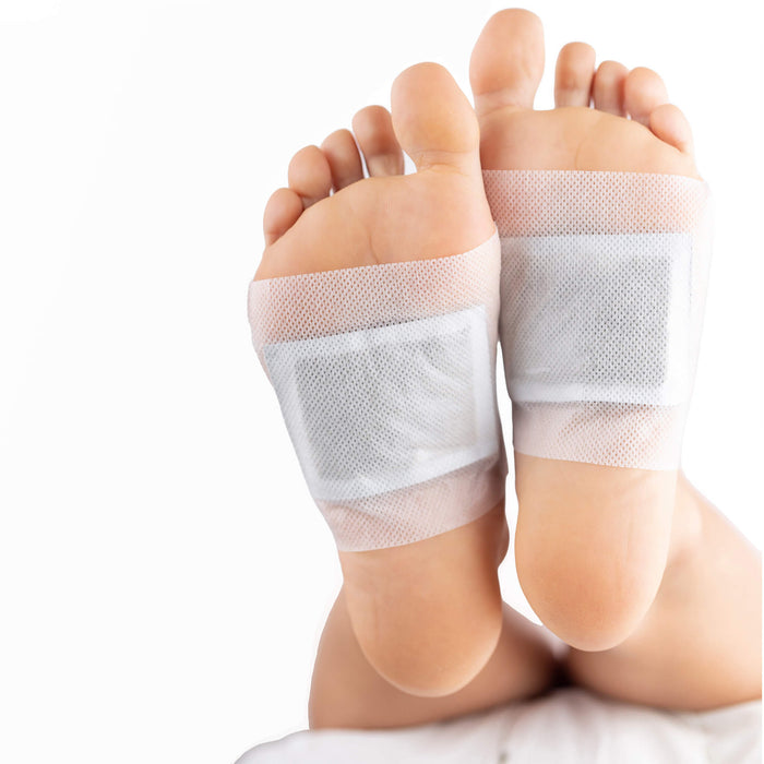 Natural Detoxifying Foot Pads on sole of feet